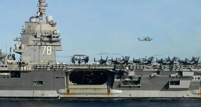  ناو جرالد فورد چند زمین فوتبال را در خود جای می‌دهد؟